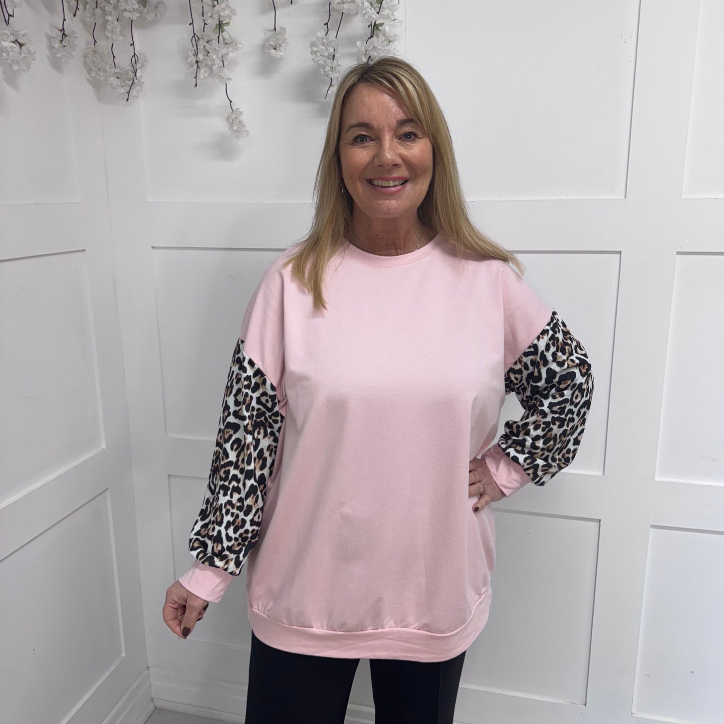 Marina: Lightweight top with leopard print sleeves. One size: 16-22