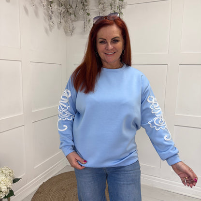 Liz: Oversized blue soft feel embroidered sweater. One size: 14-20