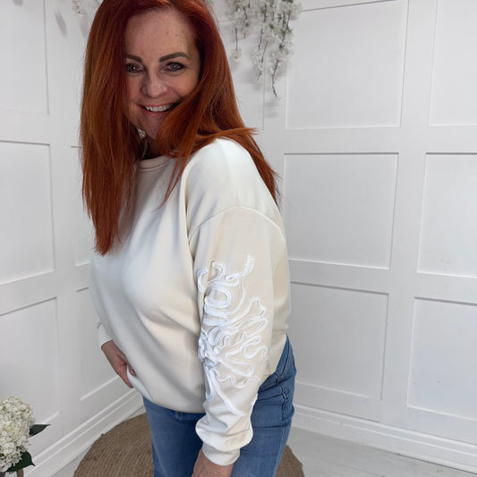 Liz: Oversized cream soft feel embroidered sweater. One size: 14-20