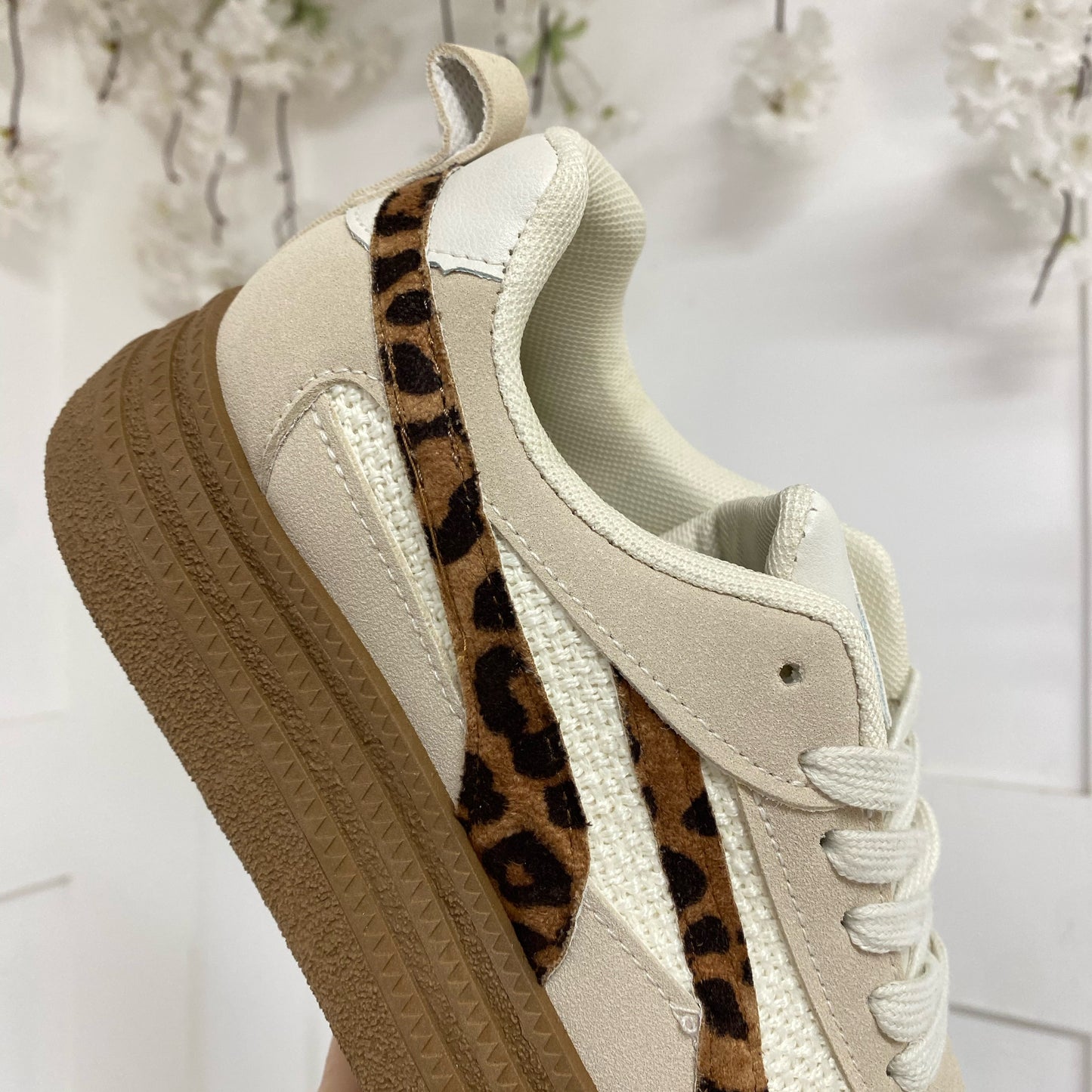 Bobbie: Cream trainers with leopard print stripe. Sizes: 3-8