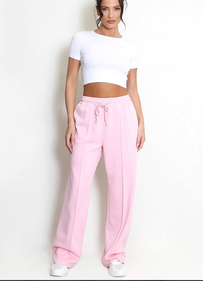 Trudy: Pink stretchy wide leg pocket trousers. 2 sizes