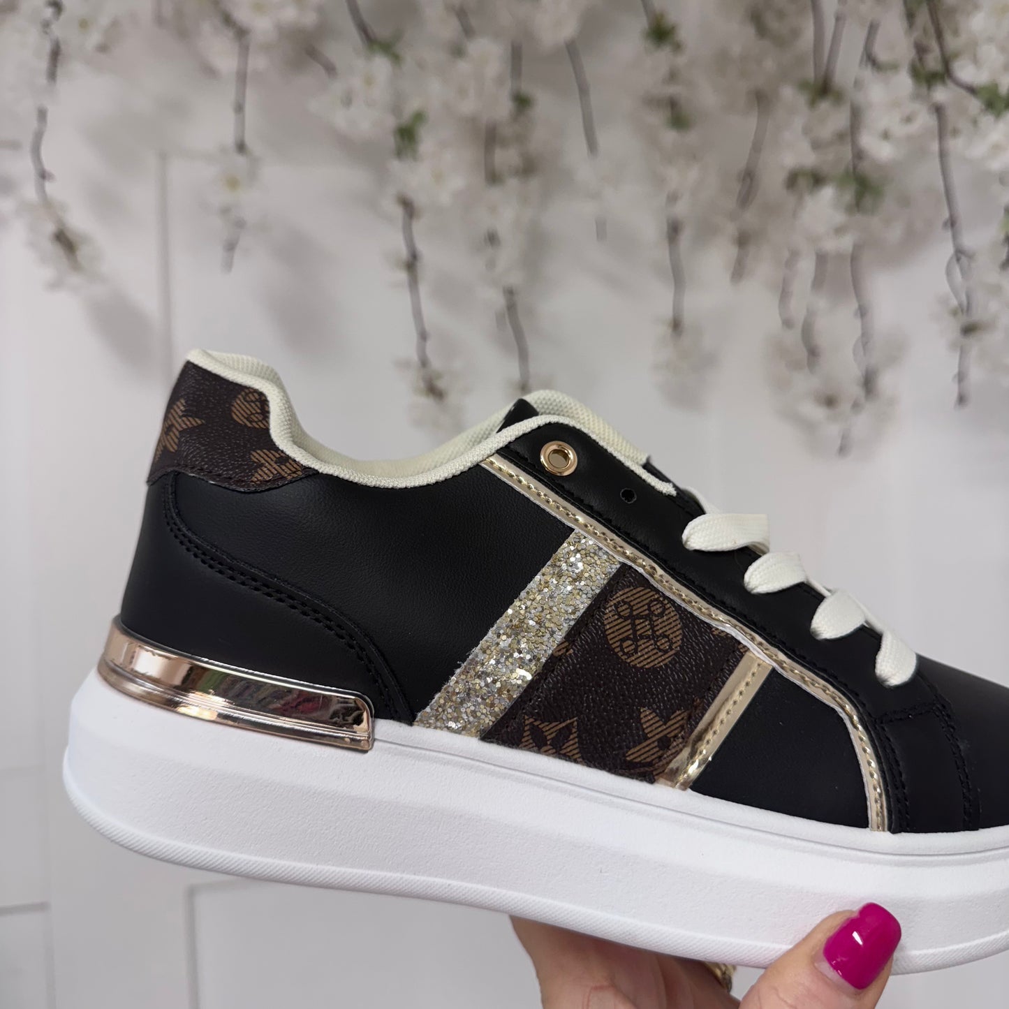 Bailey: Black & brown printed trainers. Sizes: 3-8