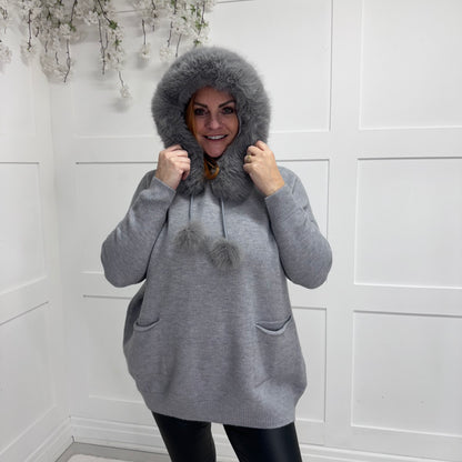 Foxy: Faux fur and pompom longline knitted hoody. One size 12-22