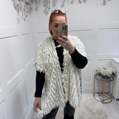 Gigi: Ostrich faux fur long gilet.  Free size