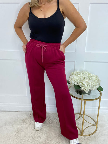 Trudy: Stretchy wide leg pocket trousers. 2 sizes