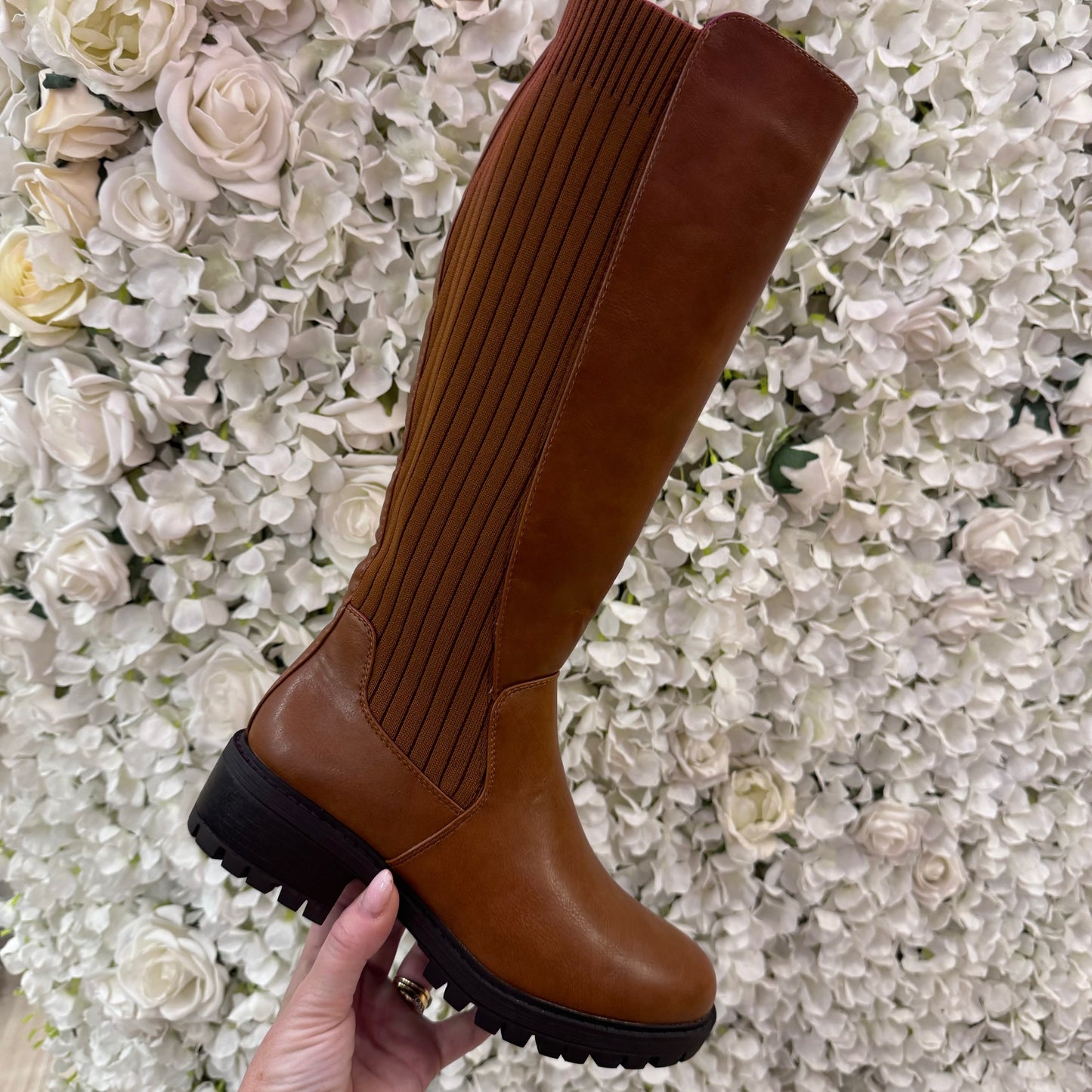 Trova Tan stretchy knee high boots. Sizes 3-8