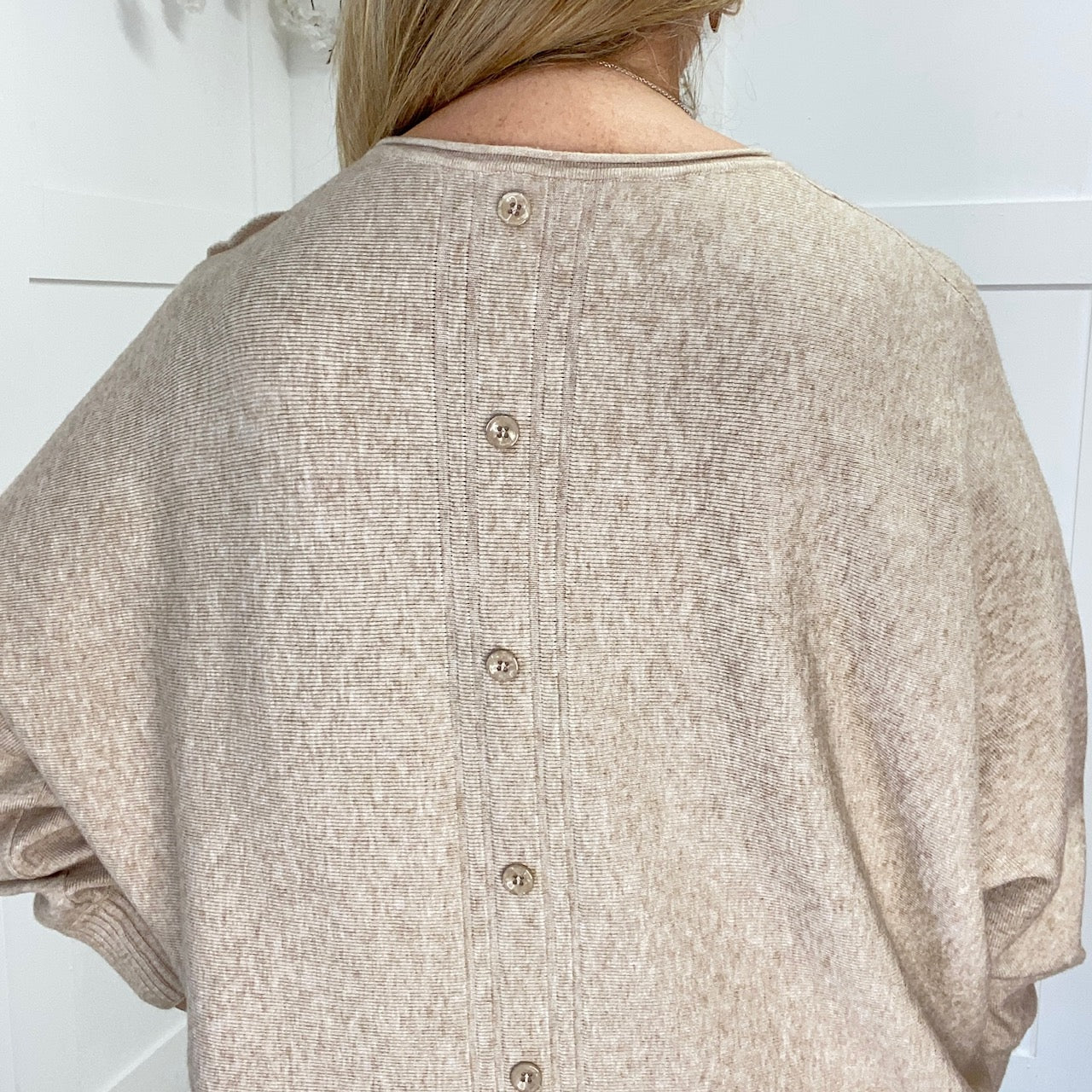 Asher: Appliqué rose top with button back. One size 16-22.