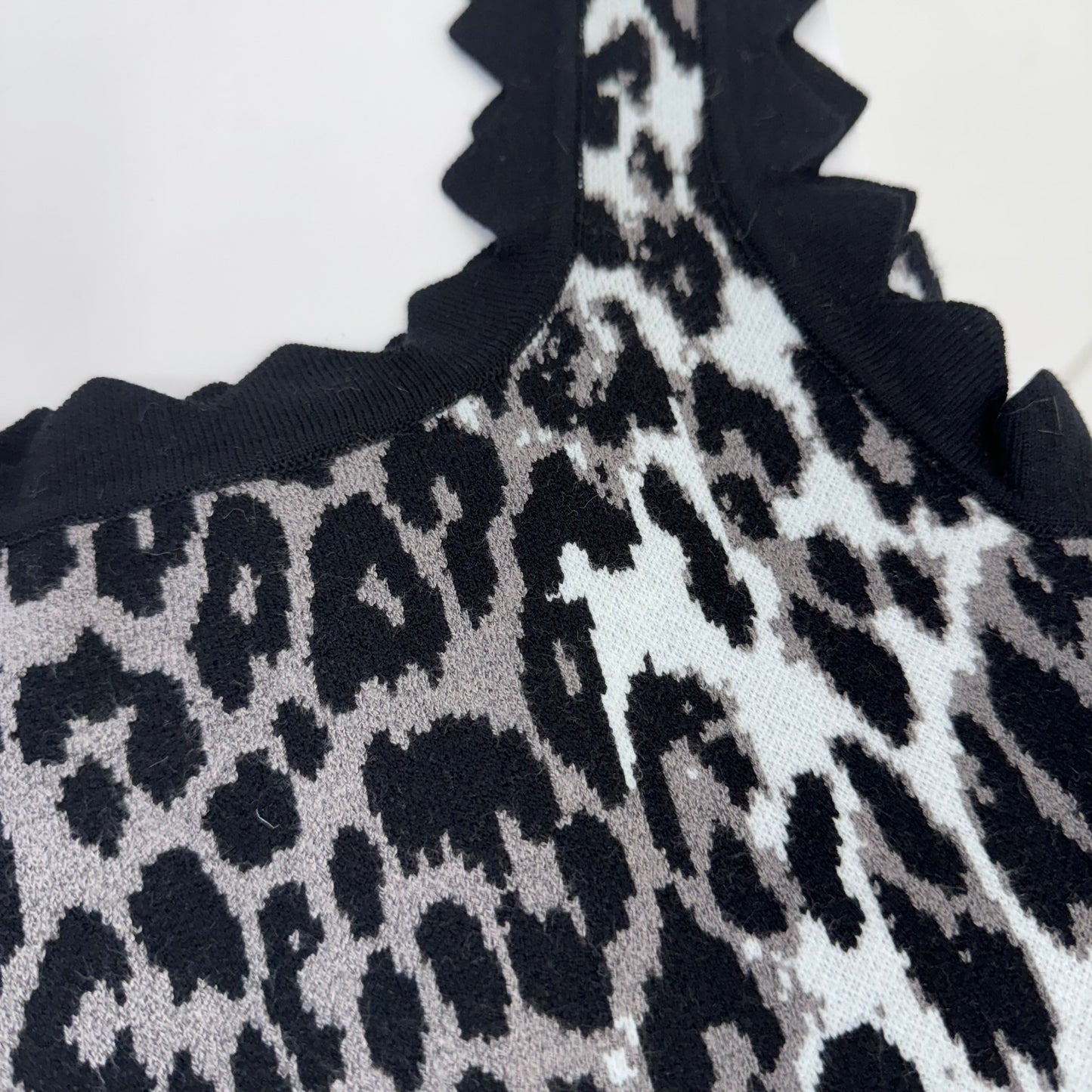 Minnie: Black & White leopard print vest. Sizes 8-12 and 12-16.